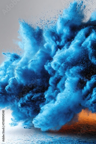 Blue dust explosion, dynamic, against white backdrop
