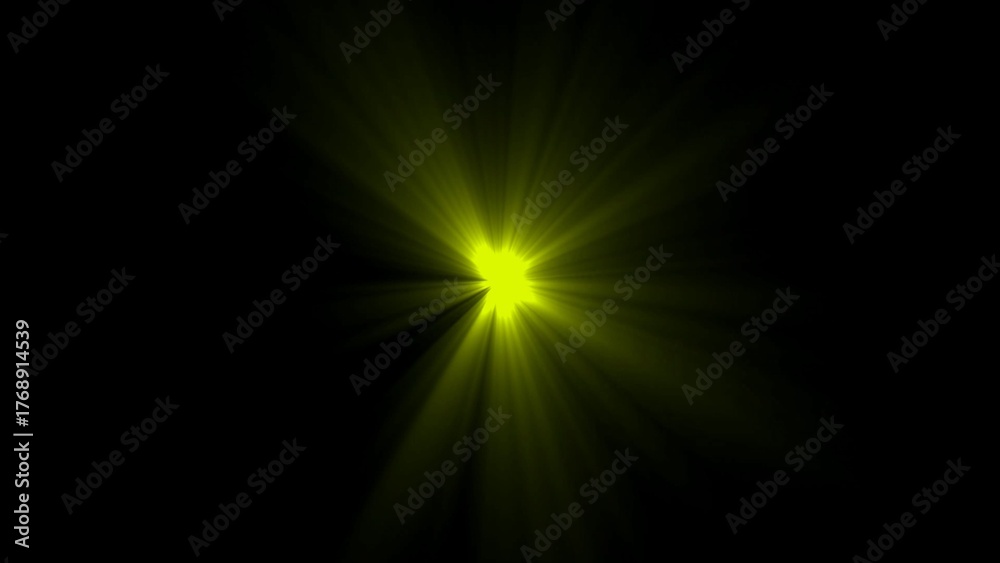 Obraz premium Bright Yellow Starburst Light Effect on Black Background