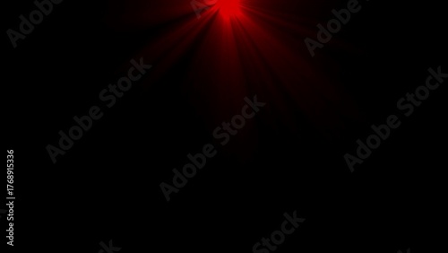 Red Light Rays Bursting from Black Background spotlight