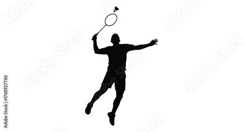 Dynamic silhouette of a male badminton player in mid air hitting a shuttlecock with a racket