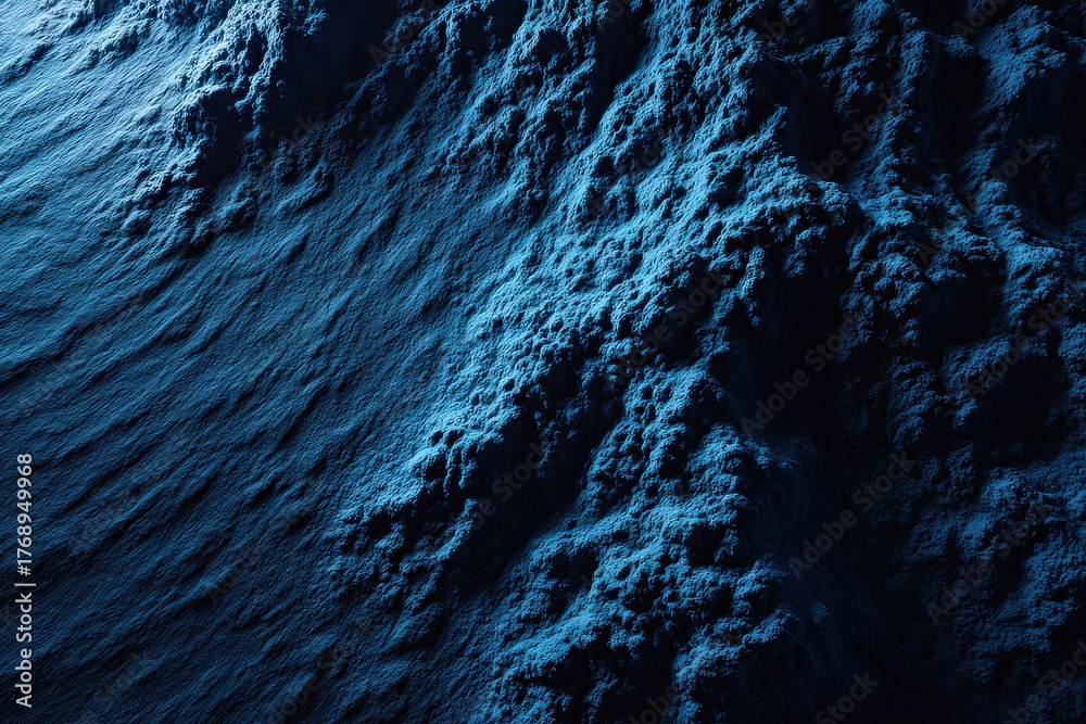 Obraz premium Abstract Textured Surface Illuminated With Deep Blue Tones Evoking Depth and Dimension