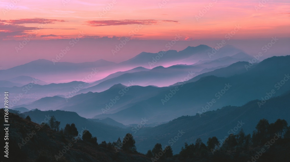 Obraz premium Serene Mountain Landscape at Dusk with Gentle Hues and Mystical Fog Overlapping the Rolling Hills in a Peaceful Natural Environment