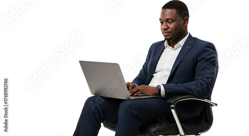Man In Blue Suit Working On Laptop Isolated On Black