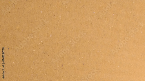 Brown paper texture background for presentation product. Pastel peach illumination, grainy color gradient background,