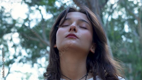 young woman relaxing at park