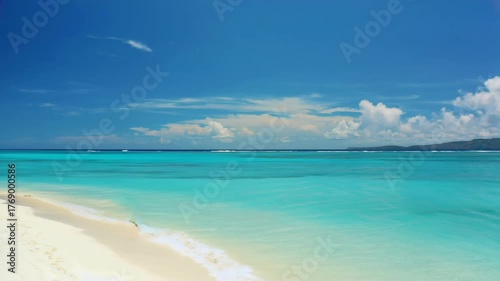 Tropical Blue Lagoon with White Clouds, Peaceful Ocean Landscape