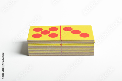 A stack of dominoes isolated on a white background