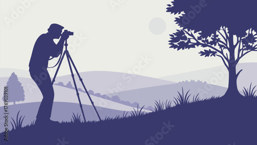 Silhouette of a photographer with a tripod in a landscape with hills and a tree under a bright sky view