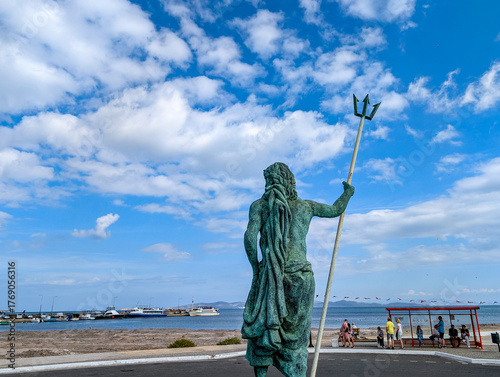 The sea god Poseidon, statue at the port of Mastichari, a coastal town on the Greek island of Kos. Poseidon is a central figure in Greek mythology