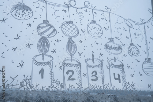 Sustainable responsible holiday decor. Christmas advent candle painted on window glass indoor at home. Christmas winter decoration. White pattern. Snow art tracery on season. Diy. Hygge home