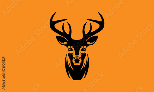 vector illustration of a deer head silhouette with an orange background