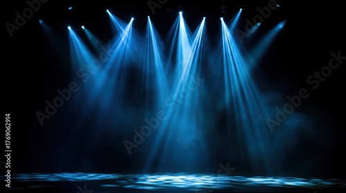 Blue Theatrical Lighting Beams Over Empty Dark Stage Environment