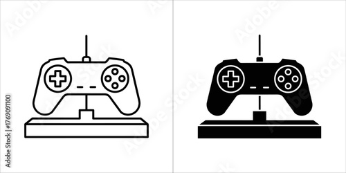 Outline and solid black icon of a video game controller on a