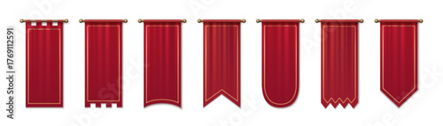 Red medieval pennant banners hanging from brass rods - royal silk flags with golden trim, pointed ends, castle cuts and decorative edges for heraldic ceremonies. Velvet tournament standards with folds