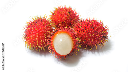 Fresh tropical rambutan fruits isolated on a white background. Close-up of vibrant red hairy rambutan with one fruit peeled open showing juicy white flesh.