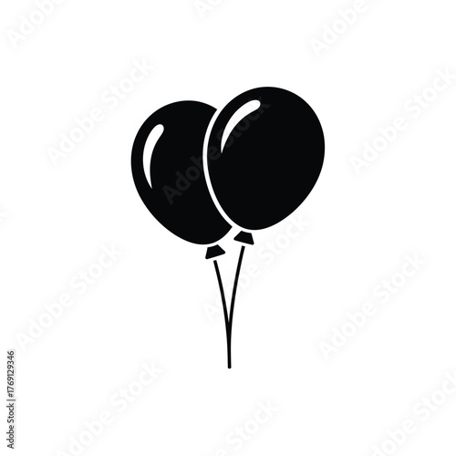 Two black balloons on strings white celebration