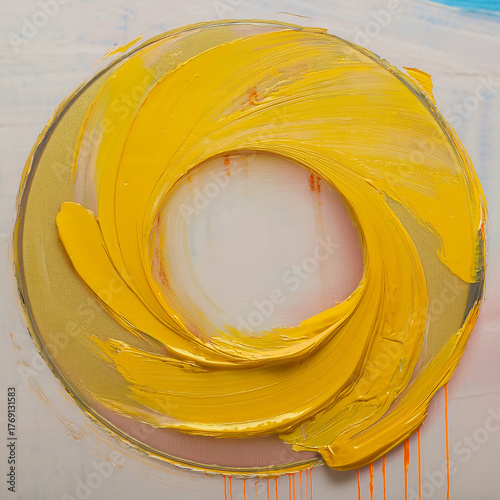 A circle painted with yellow paint. Geometry, shape, expression. Dripping paint.