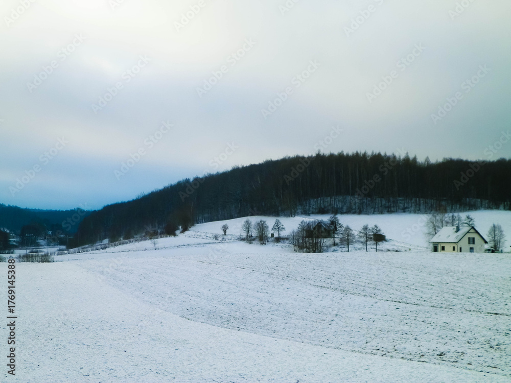 Fototapeta premium Winter over Kashubian hills, Wiezyca, Poland.