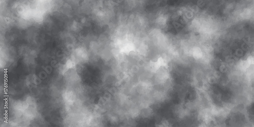Dark abstract black and white texture of smoke and a stormy cloudscape with motion