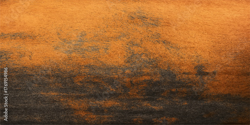 Dried brown grass in sun on a rough, rusty metal surface, creating a dirty, dark, vintage grunge texture background