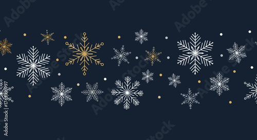 Winter pattern with golden and white snowflakes on a dark background, festive holiday season