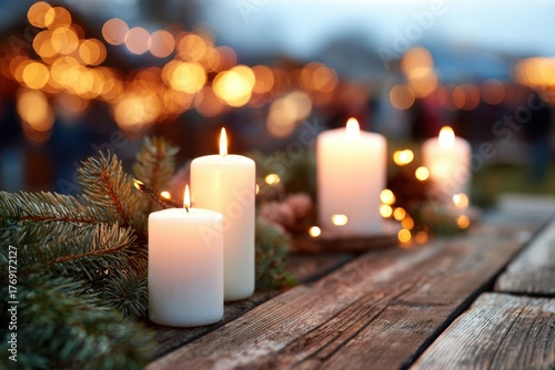 White candles with christmas decorations