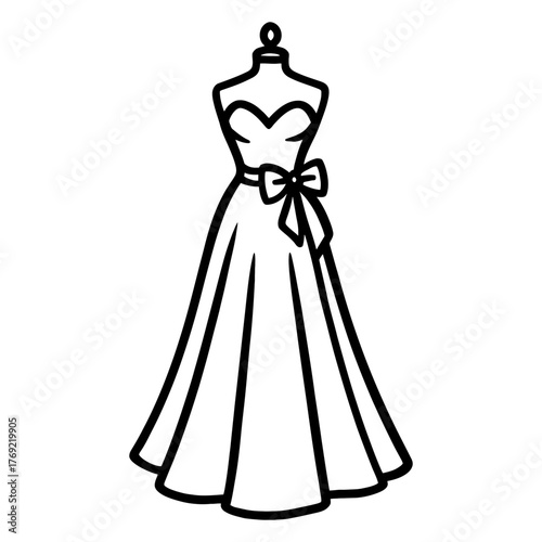 Elegant strapless wedding gown with bow design on mannequin.