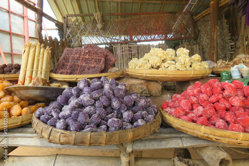 Colourful sweets made of palm sugar for sale at a market stall in Bagan, Myanmar