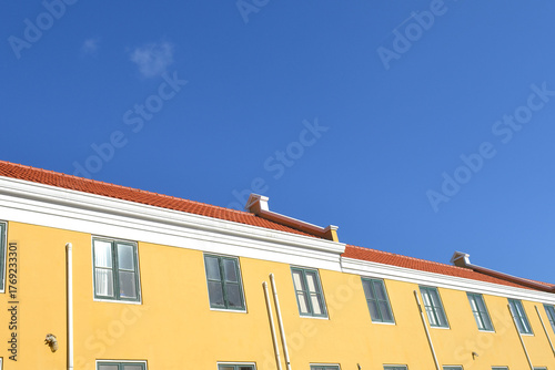 Yellow Dutch Colonial House in the Caribbean