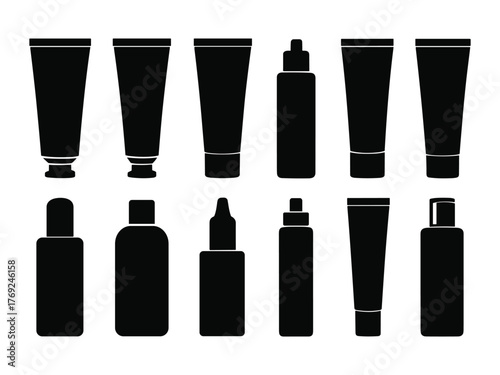 Assortment of black cosmetic tubes and bottles