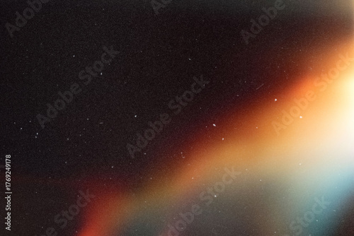 light leak overlay effect with scratch dust and blur colorful light leaks,retro noisy film texture light leak flare on black background,abstract background with colorful light,grunge old film burn