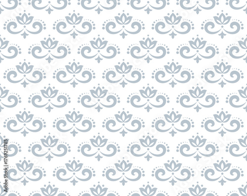 Wallpaper in the style of Baroque. White and gray floral ornament. Seamless vector background. Graphic pattern for fabric, wallpaper, packaging. Ornate Damask flower illustration