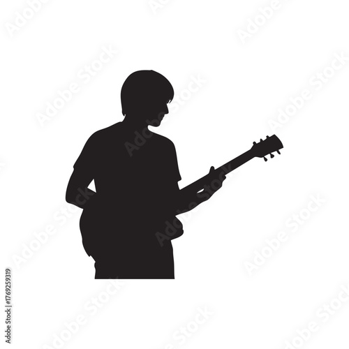 Silhouette of a man playing an electric guitar