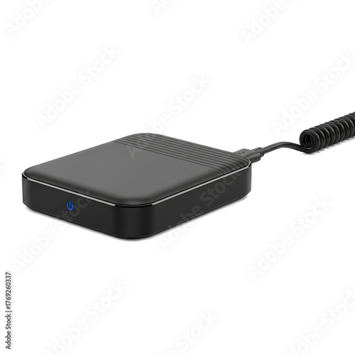 A square black device with a spiral cord connected, possibly for charging. A small blue light indicates power. The background is black