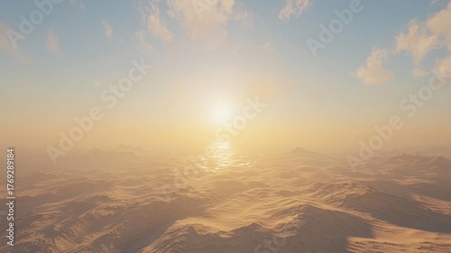 Sunset over a vast, hazy desert landscape.