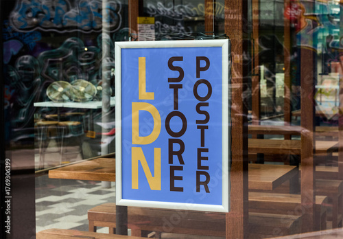 Menu Poster hangs in a cafe window in London