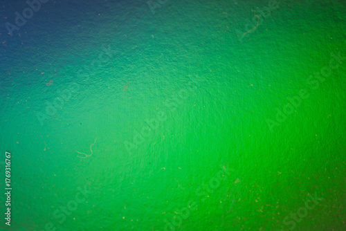 Abstract color texture. Dusty gradient macro texture. Dark background.
