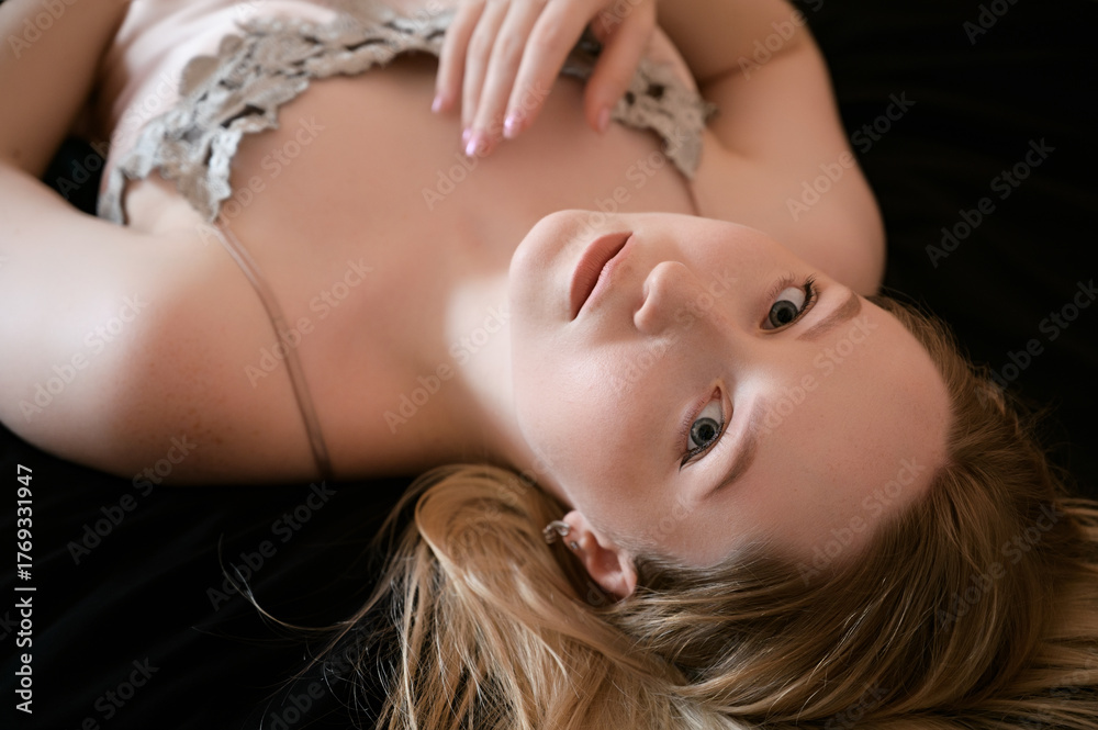 Naklejka premium Sensual portrait of a beautiful woman with soft seatures.