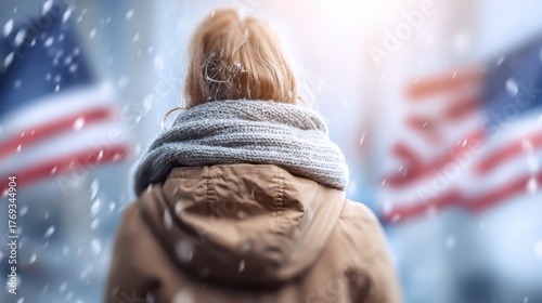 Woman walks in snow wearing warm coat and scarf woman navigates through snow bundled in coat and scarf