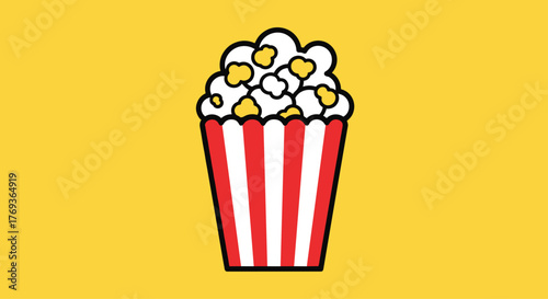 Vibrant striped popcorn bucket overflowing with fluffy kernels, perfect for movie nights and snack time celebrations