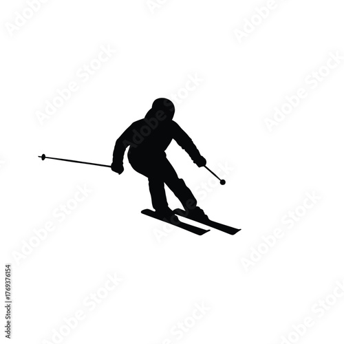 Silhouette of a skier in motion on a snowy slope