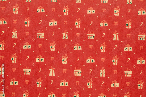 red Christmas background with candy cane and gifts,seamless pattern of candy cane and gifts on red background,Christmas wrapping paper, Xmas pattern with ornaments.