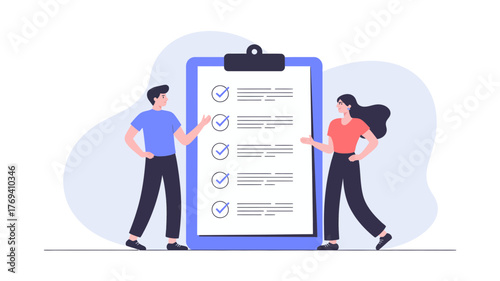 Two people reviewing a completed checklist on a large clipboard with multiple items marked as done and checked off