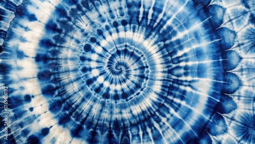 Intricate Spiral Dye Pattern in Shades of Blue and White Featuring a Circular Design with Radial Lines and Variations in Tone