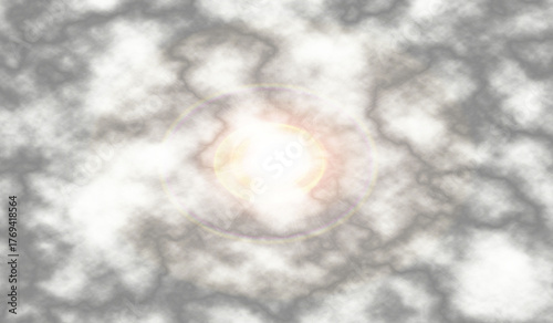 Abstract ethereal glowing light emanating from a central point surrounded by soft smoky textures