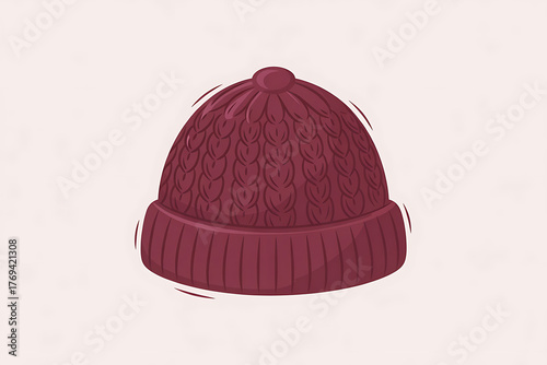 A burgundy knitted beanie hat, warm and cozy, perfect for chilly weather and winter days.