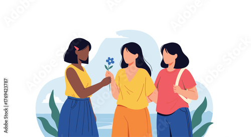 Three diverse women share a moment of friendship as one offers a blue flower to another in a peaceful outdoor landscape.