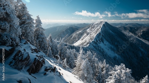 snowy mountain peak under clear sky in natural winter landscape