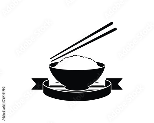 Black bowl of rice with chopsticks and ribbon food would food day
