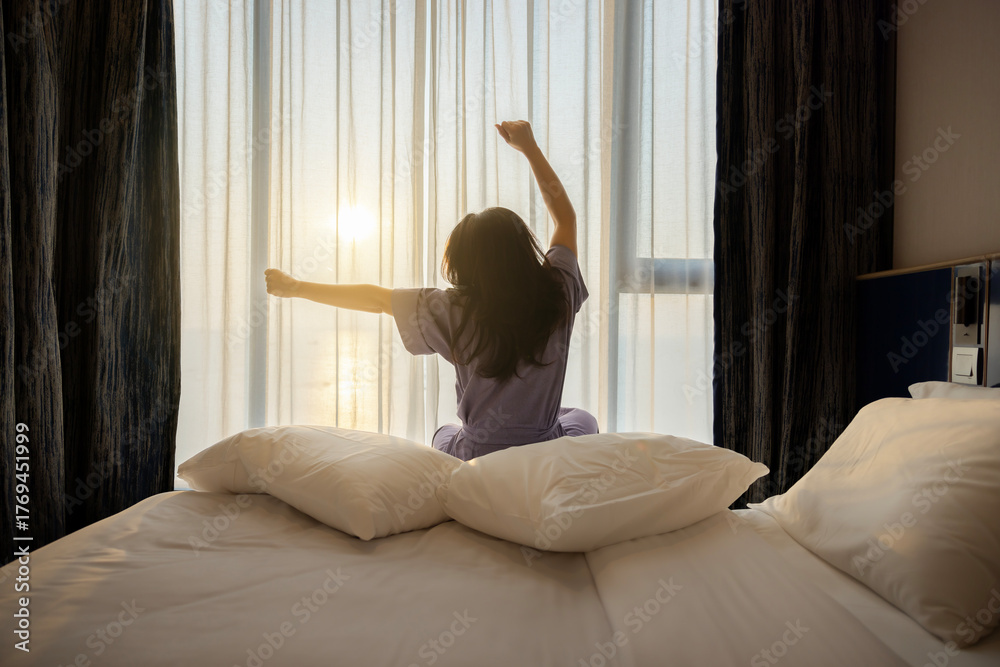 custom made wallpaper toronto digitalGood morning, New day, Holiday. Happy asian middle aged woman wake up on bed, stretching her arms in fresh early morning, relax peaceful morning routine. Luxury hotel or home in the morning sunlight.